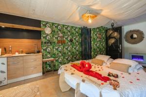 Appartements Le Vesuve avec jaccuzi : photos des chambres