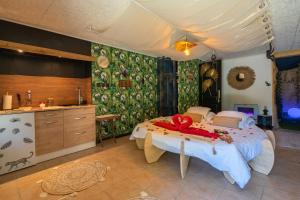 Appartements Le Vesuve avec jaccuzi : photos des chambres