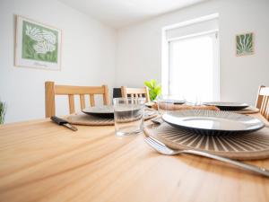Appartements Le Regard sur La Place Leger et Raffine : photos des chambres