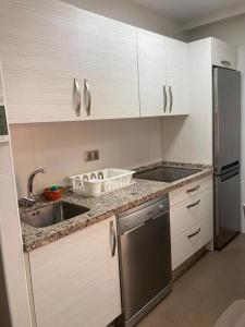 CALU Homes cerca de estación de tren