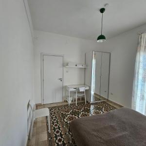 ESSENTIAL ROOM & PARKING in Centro Città con Parcheggio Privato e WIFI