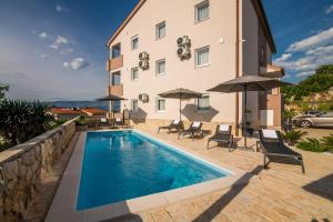 Apartment TRIES 1 with heated pool and sea view 