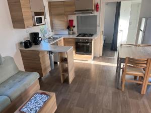 Villages vacances mobil home ronce le bain : photos des chambres