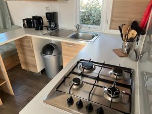Villages vacances mobil home ronce le bain : photos des chambres