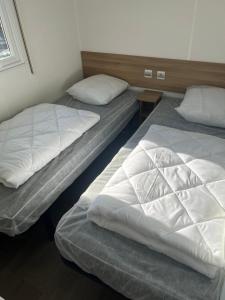 Villages vacances mobil home ronce le bain : photos des chambres