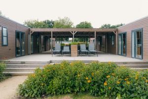 Groepsvakantie op de Veluwe – 4 losse lodges voor 24 personen op Vakantiepark De Boshoek