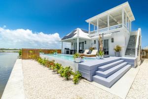 Canalfront Retreat and Pool Club at Mahogany Bay