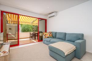 HostWise - Sunny Escape with a Pool & Balcony