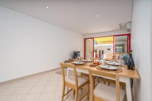 HostWise - Sunny Escape with a Pool & Balcony