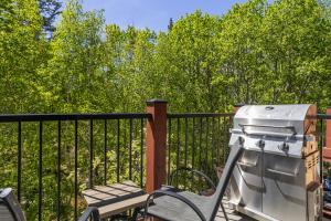Creekside Condo Steps from Main Street Mountain Views Fireplace