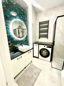 Salon z widokiem na jezioro Kisajno i 2 sypialnie