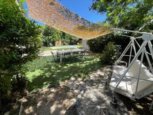 Maisons de vacances Maison calme, piscine et festival a deux pas : photos des chambres