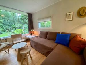 Gezellig huisje heel rustig gelegen met grote bostuin en houtkachel