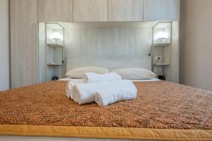 Trilocale a pochi passi dal mare con giardino con WiFi