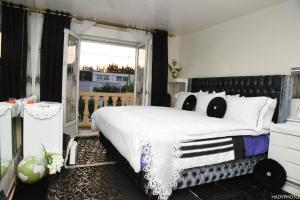 Sejours chez l'habitant Villa confort - Hebergement Touristique Grand PARIS : photos des chambres