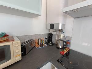 Appartements T1 cosy vue mer : photos des chambres