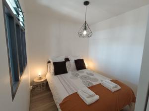 Appartements T1 cosy vue mer : photos des chambres