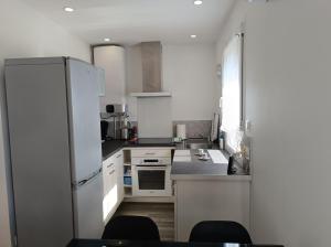 Appartements T1 cosy vue mer : photos des chambres