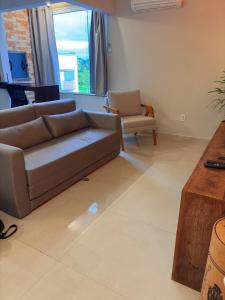 Apartamento com ar-condicionado, Wi-Fi no Campeche e estacionamento gratuito