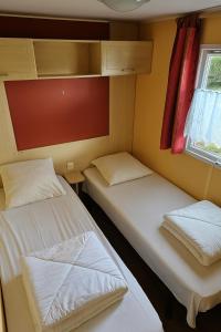 Campings Camping de brehadour 4 etoiles Mobil-home 7 personnes Equipement bebe inclus : photos des chambres