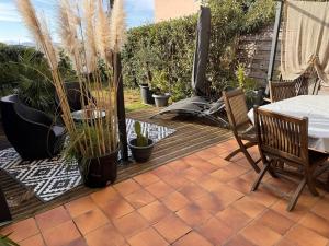 Appartements Charmant appartement renove au calme avec jardin, a 100m des commerces - FR-1-726-56 : photos des chambres