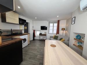 Appartements L'endormi - Centre ville - WIFI et NETFLIX : photos des chambres