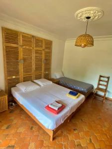 Villas Private villa with pool : photos des chambres