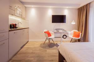 Rosa Apartment with kitchen room in Brera Serviced Apartments Frankfurt City