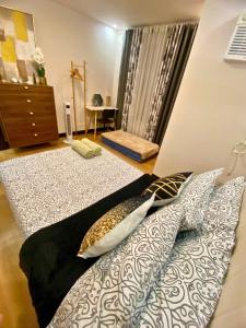 Neat and Fresh Fast Wifi with Pay parking PH Arena condo