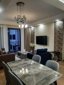 Executive classy apartment with executive finishes and luxurious modern facilities and which features a relaxing chill rooftop with breathtaking views