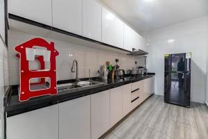 classy tastefully furnished executive three bedroom apartment with fully equipped gym ample parking space swimming pool children playing ground and amazing scenic views