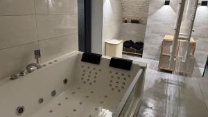 Appartements Appartement avec un souplex en pierre : photos des chambres