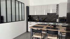 Appartements Appartement avec un souplex en pierre : photos des chambres