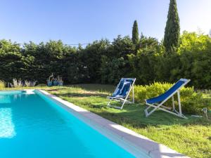 Maisons de vacances Holiday Home Un petit coin de paradis by Interhome : photos des chambres