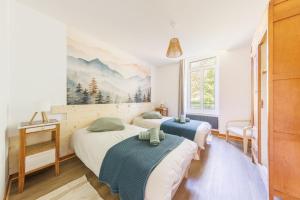 Appartements Source Fenestre - Proche Puy de Sancy : photos des chambres