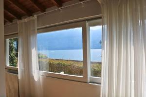 Luxury townhouse with panoramic Como lake views by Aura Luxury Collection