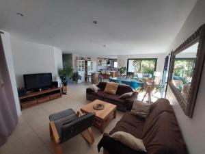 Villas Tres belle villa avec piscine : photos des chambres