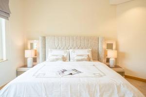 Premium 4BR Apt Pool Palm Beach Club Dubai