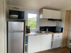 Campings Mobil Home Sainte Cecile : photos des chambres