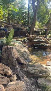 Spacious and luxurious villa with 4 bedrooms, swimming pool, tennis court, and beach within walking distance