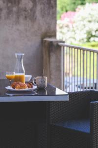 Appartements Le Nid Urbain, terrasse, garage et confort : photos des chambres