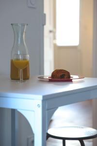 Appartements Le Nid Urbain, terrasse, garage et confort : photos des chambres