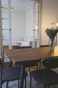 Appartements Le Nid Urbain, terrasse, garage et confort : photos des chambres