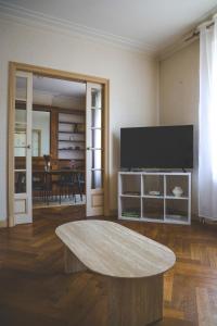 Appartements Le Nid Urbain, terrasse, garage et confort : photos des chambres