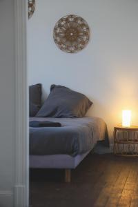 Appartements Gite Urbain clim et terrasse : photos des chambres