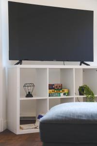 Appartements Gite Urbain clim et terrasse : photos des chambres