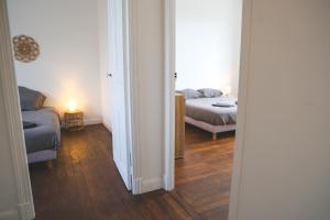 Appartements Gite Urbain clim et terrasse : photos des chambres