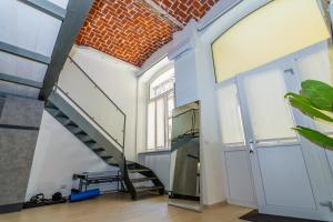 Industrial Loft -center of Turin- by HAPPYHOSTORINO