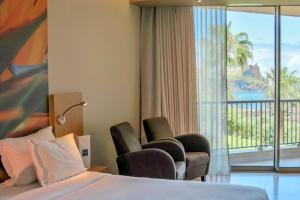 Twin Room with Sea View room in Four Views Oasis