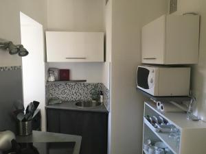 Appartements Le Studio d-en O, au coeur de la ville haute : photos des chambres